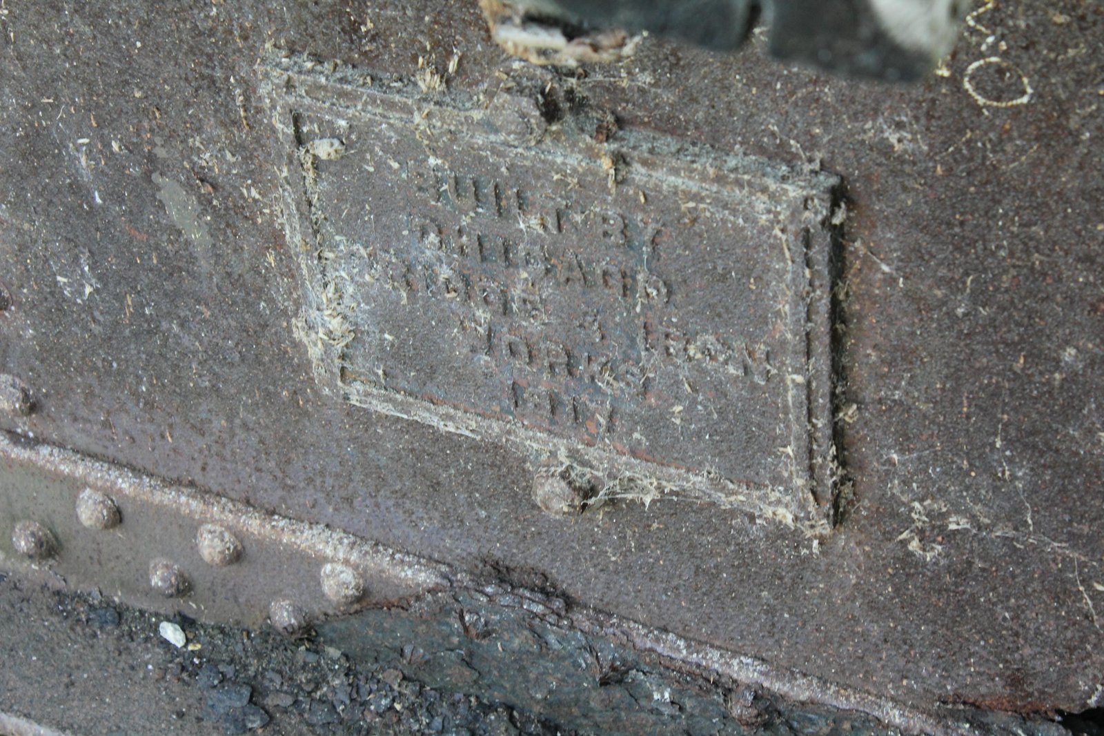 Plaque, prior to reuse as a pedestrian bridge